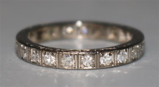 A platinum and diamond full eternity ring, size M.